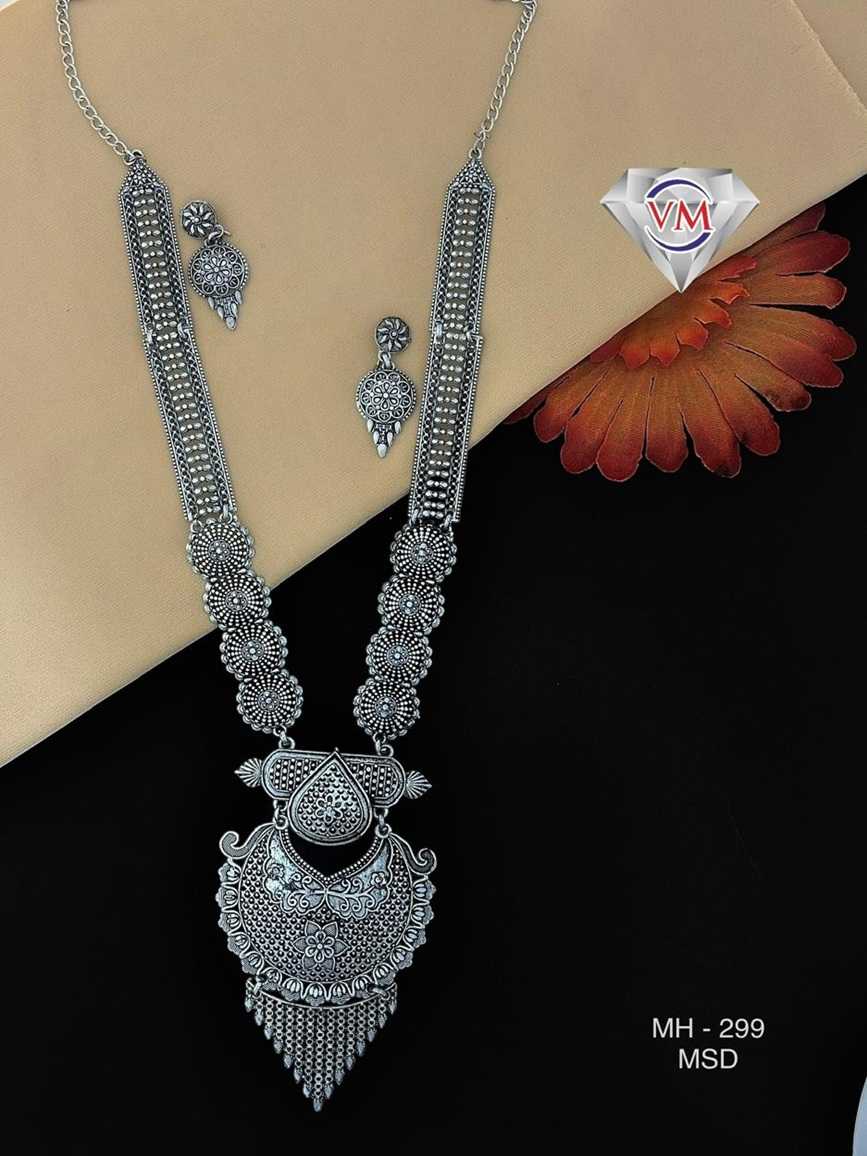 antique silver necklace set with layered engraved pendant and ethnic earrings
