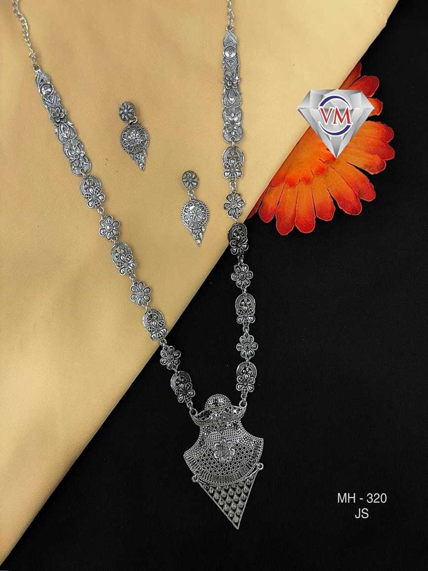 oxidized silver necklace set with shield shaped pendant and matching earrings