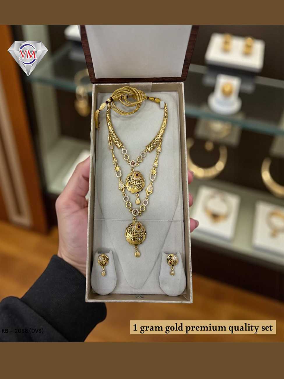 traditional 1 gram gold premium necklace set with detailed pendant work and matching earrings