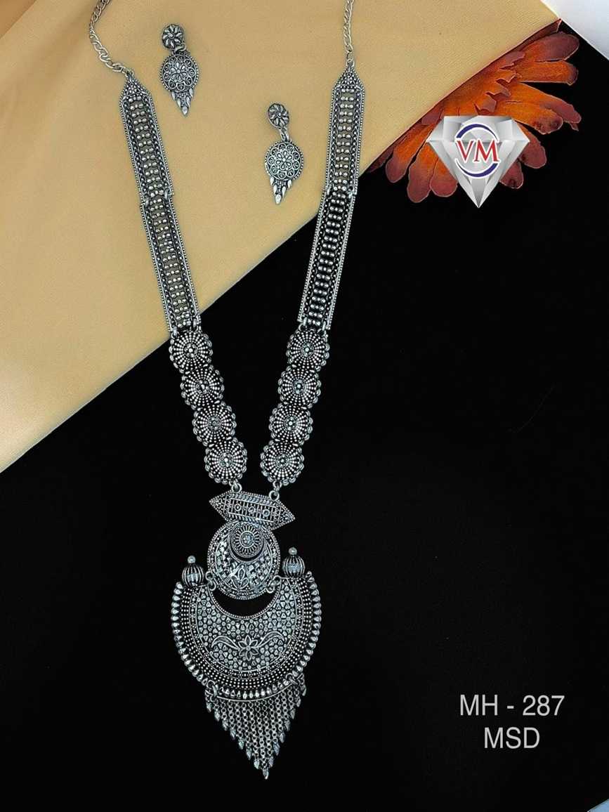 oxidized silver long necklace set with heavy floral pendant and matching earrings