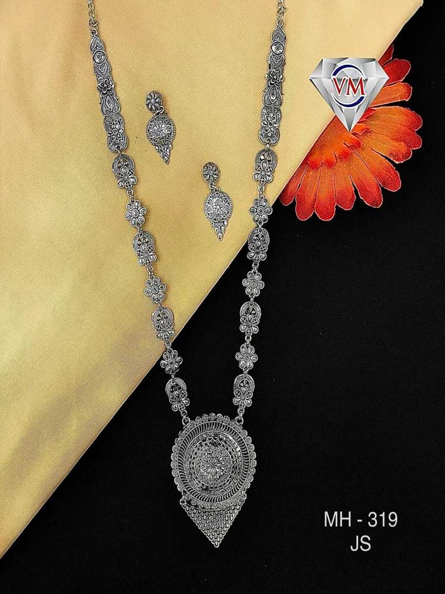 oxidized silver ethnic necklace set with circular motif pendant and earrings