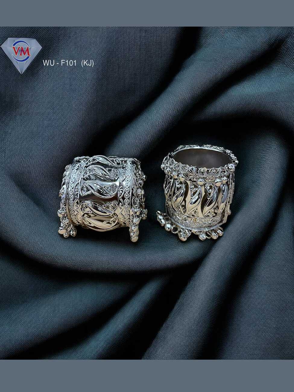 Oxidized silver kada featuring vine motif design with hanging bell drops