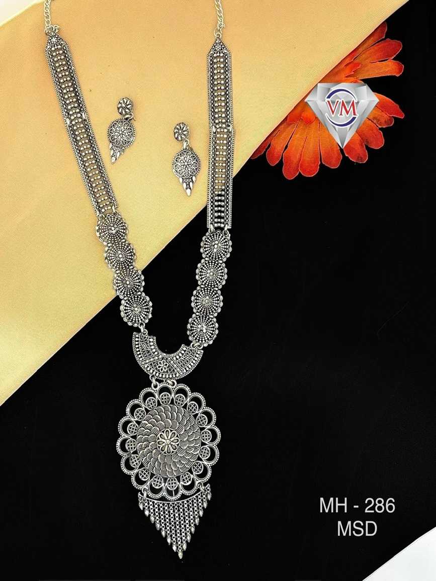 oxidized silver necklace set with round statement pendant and matching earrings