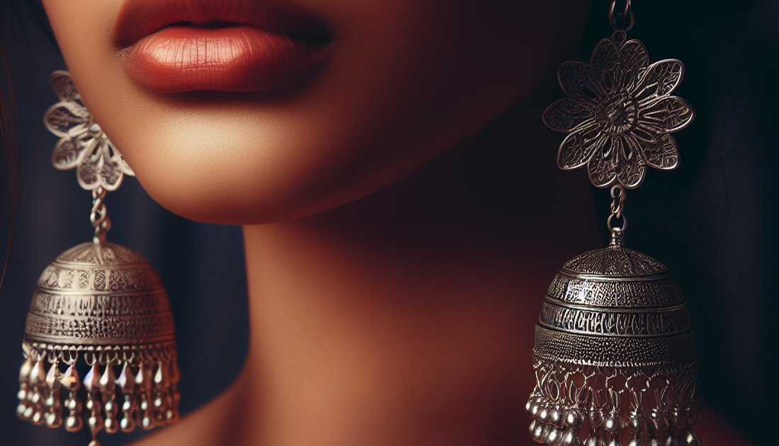 Bohemian-style jhumkas with feathers and beads for a free-spirited look.