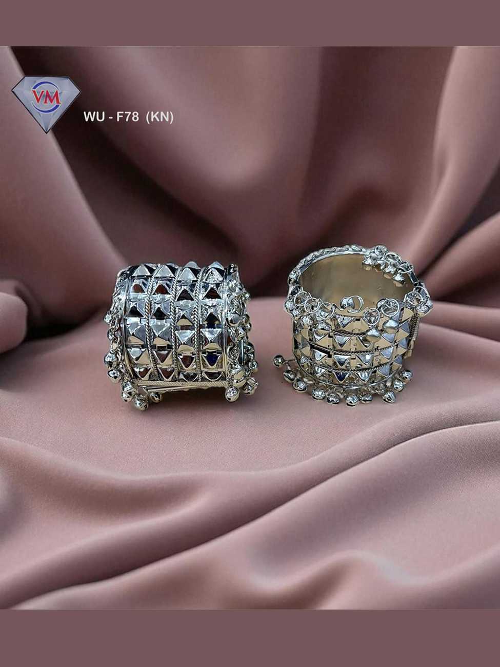 Oxidized silver kada with pyramid stud pattern and ghungroo accents