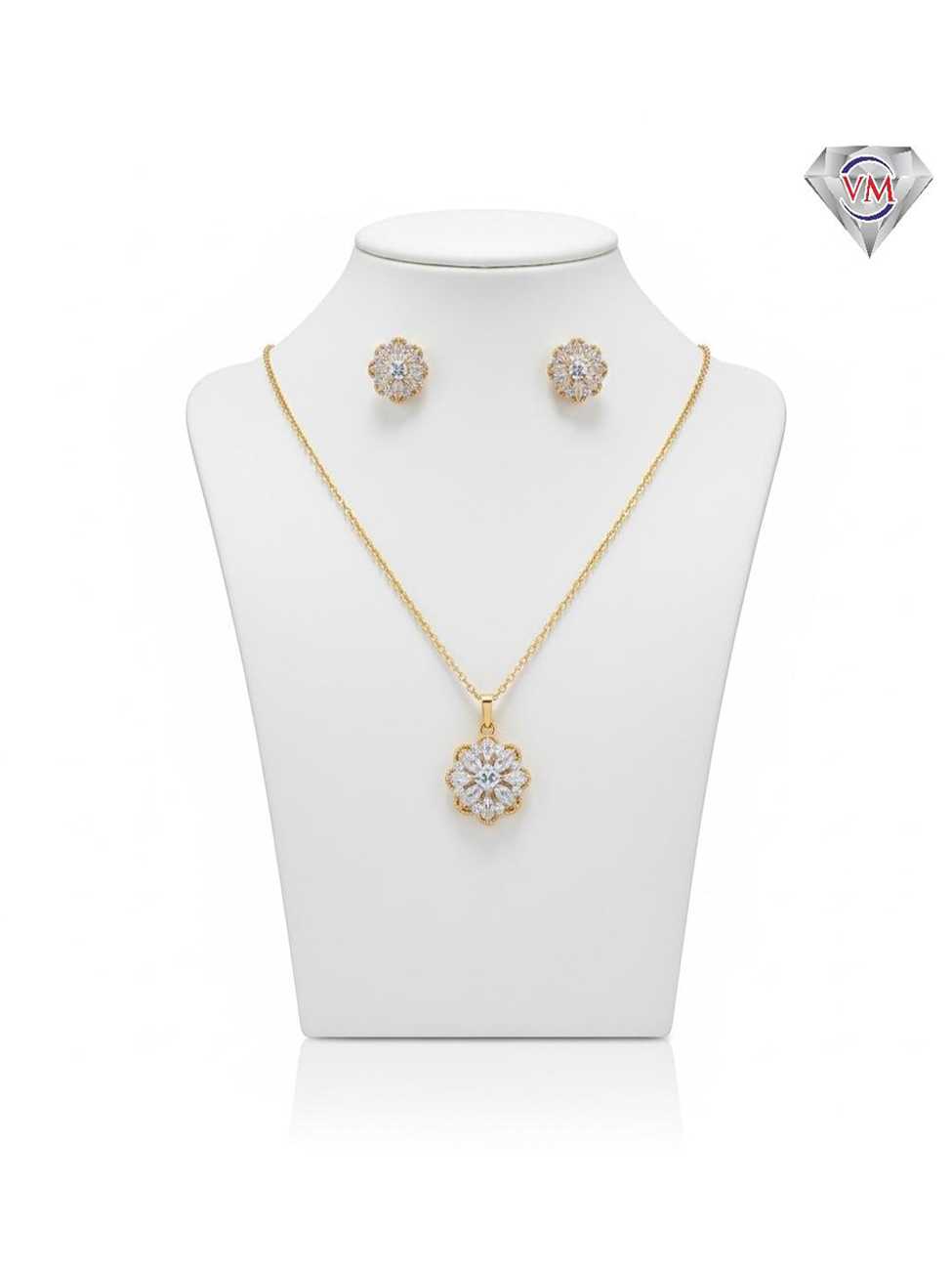Gold plated floral pendant and earrings with a central round stone and scalloped gold borders encrusted with CZ