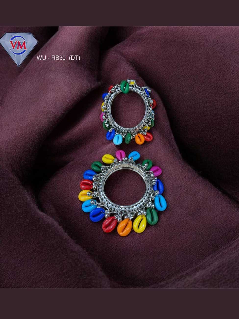 Oxidized silver kada with multicolor beads and shell drop detailing