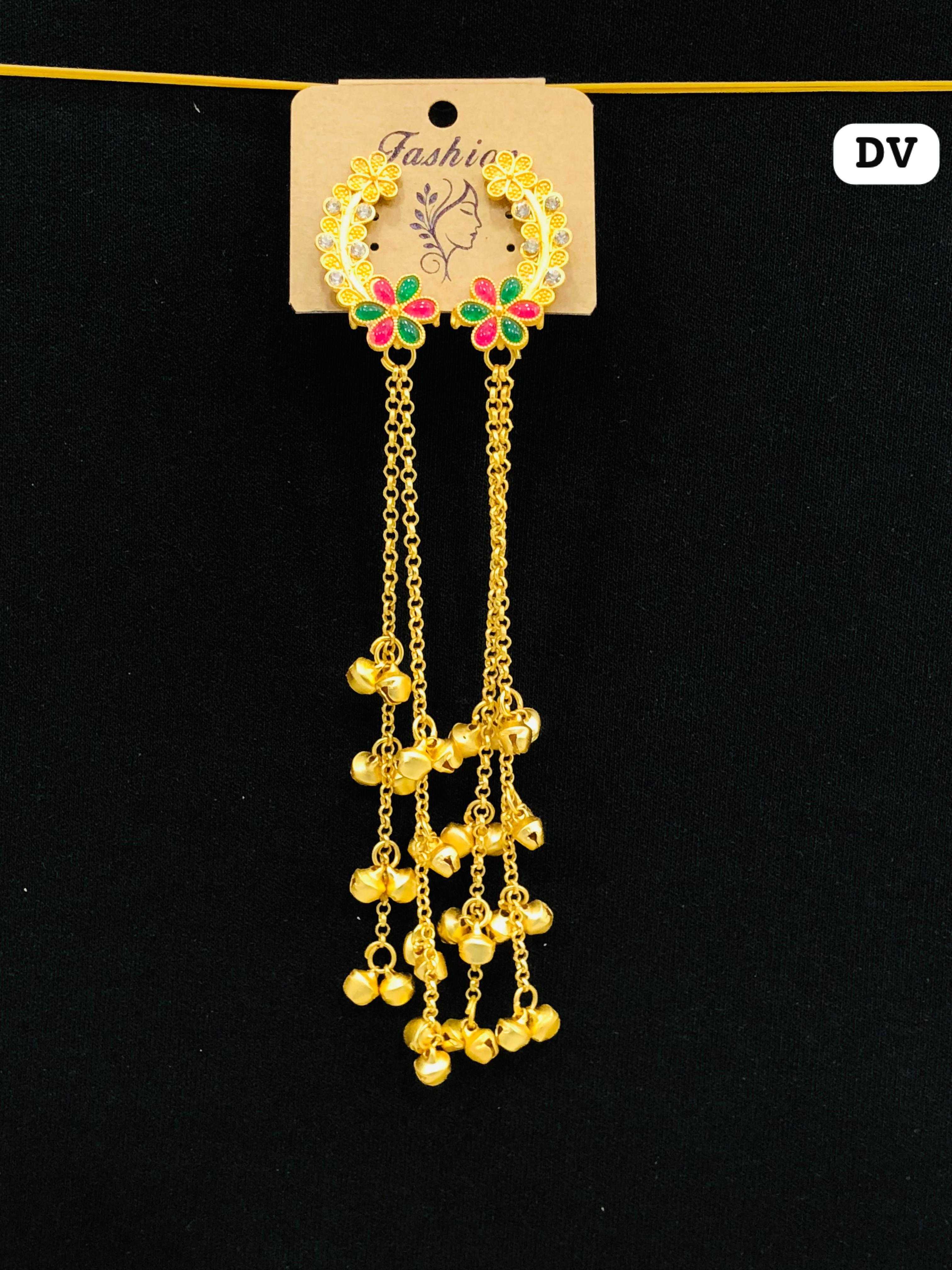 Gold-plated half-moon hoop earrings with white crystals and pink/green enamel flowers, featuring three dangling chains with golden bells.