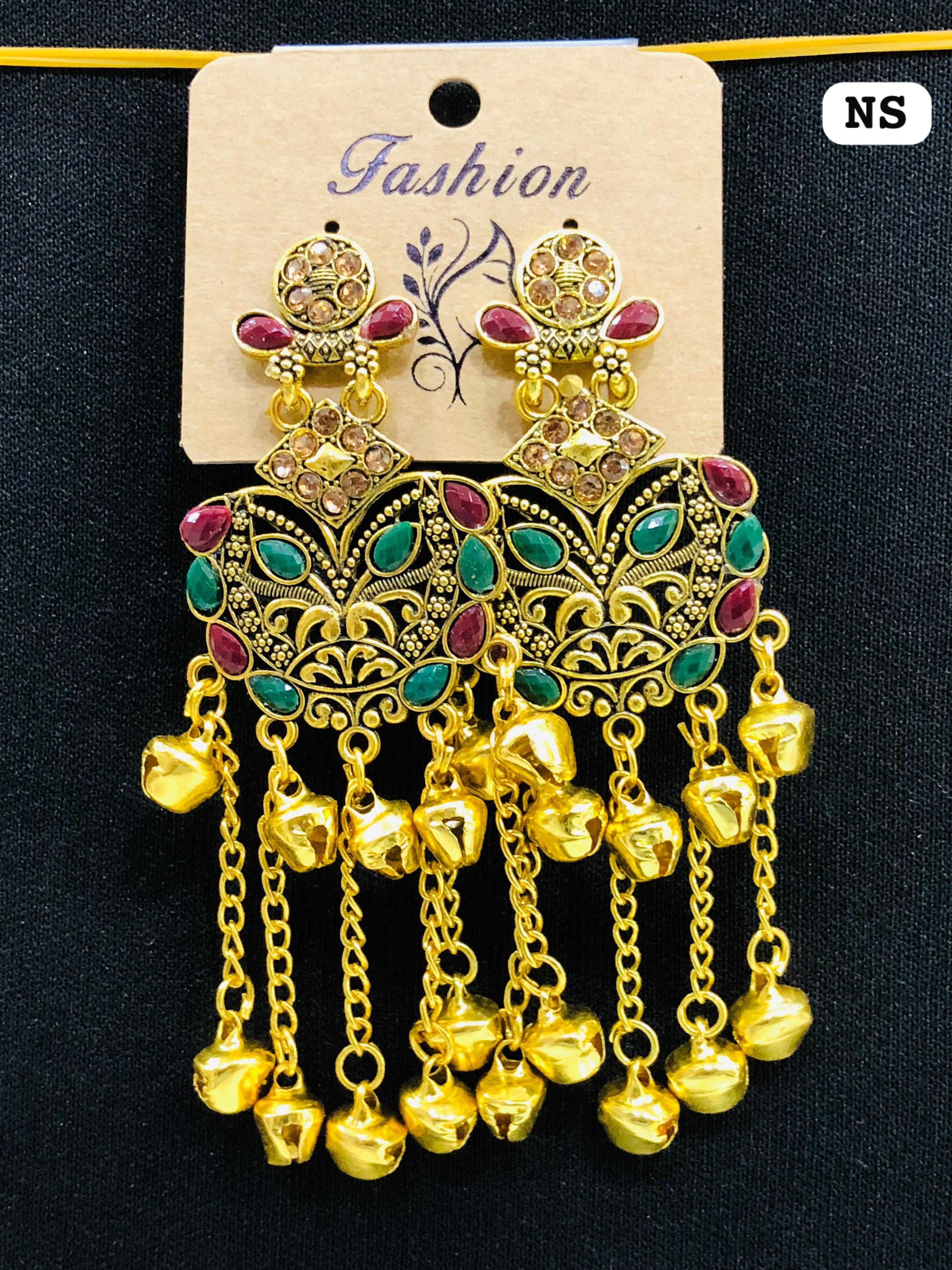 Antique gold shield-shaped earrings with intricate filigree, green and red teardrop stones, and five dangling chains with bell ends.