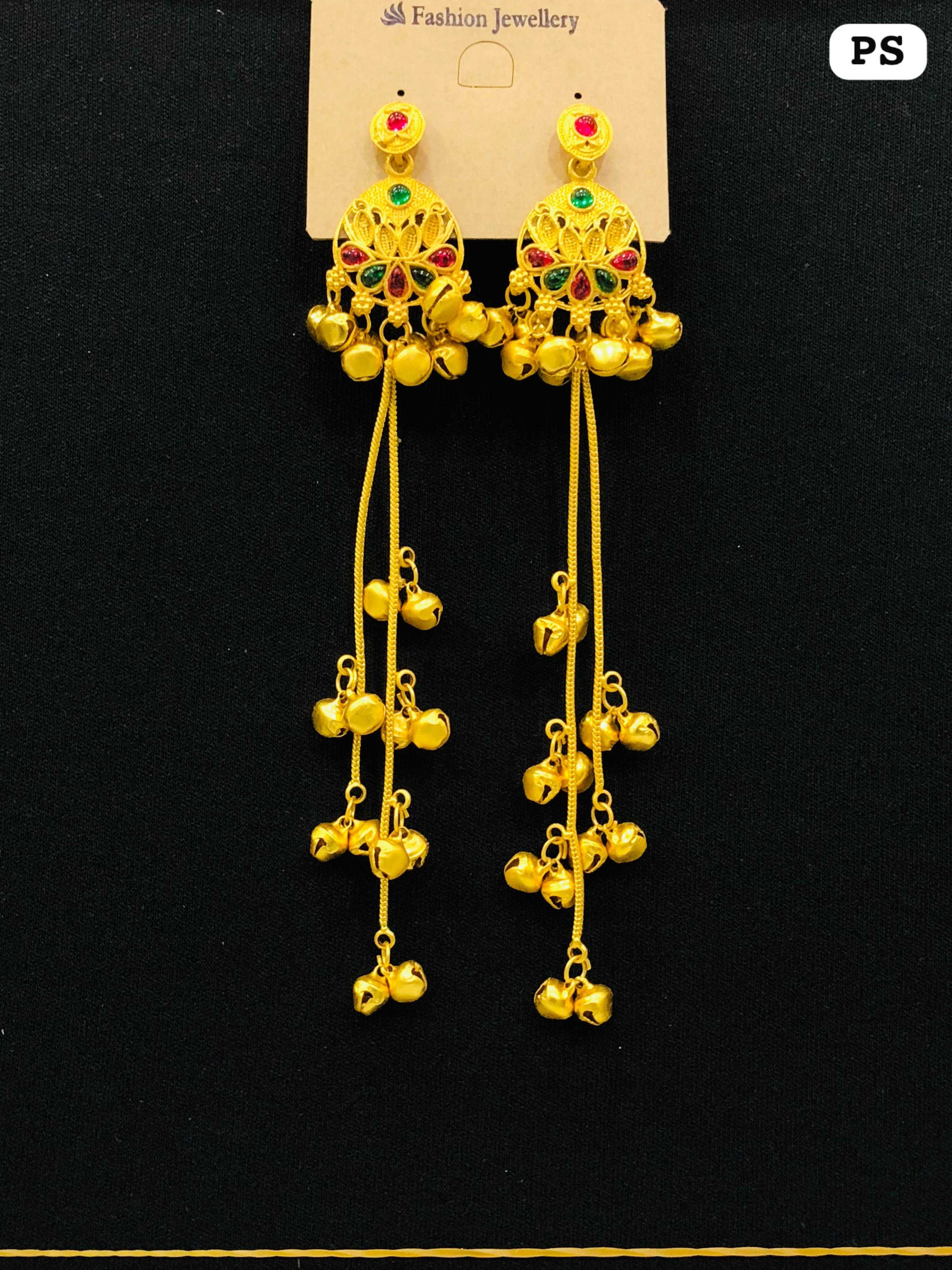 Gold earrings featuring a round floral shield stud with green and red stone accents and long single-strand bell chains.